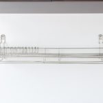 Organização premium: por que investir em divisórias para prateleiras?